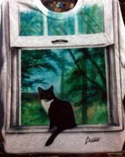 Cat In A Window